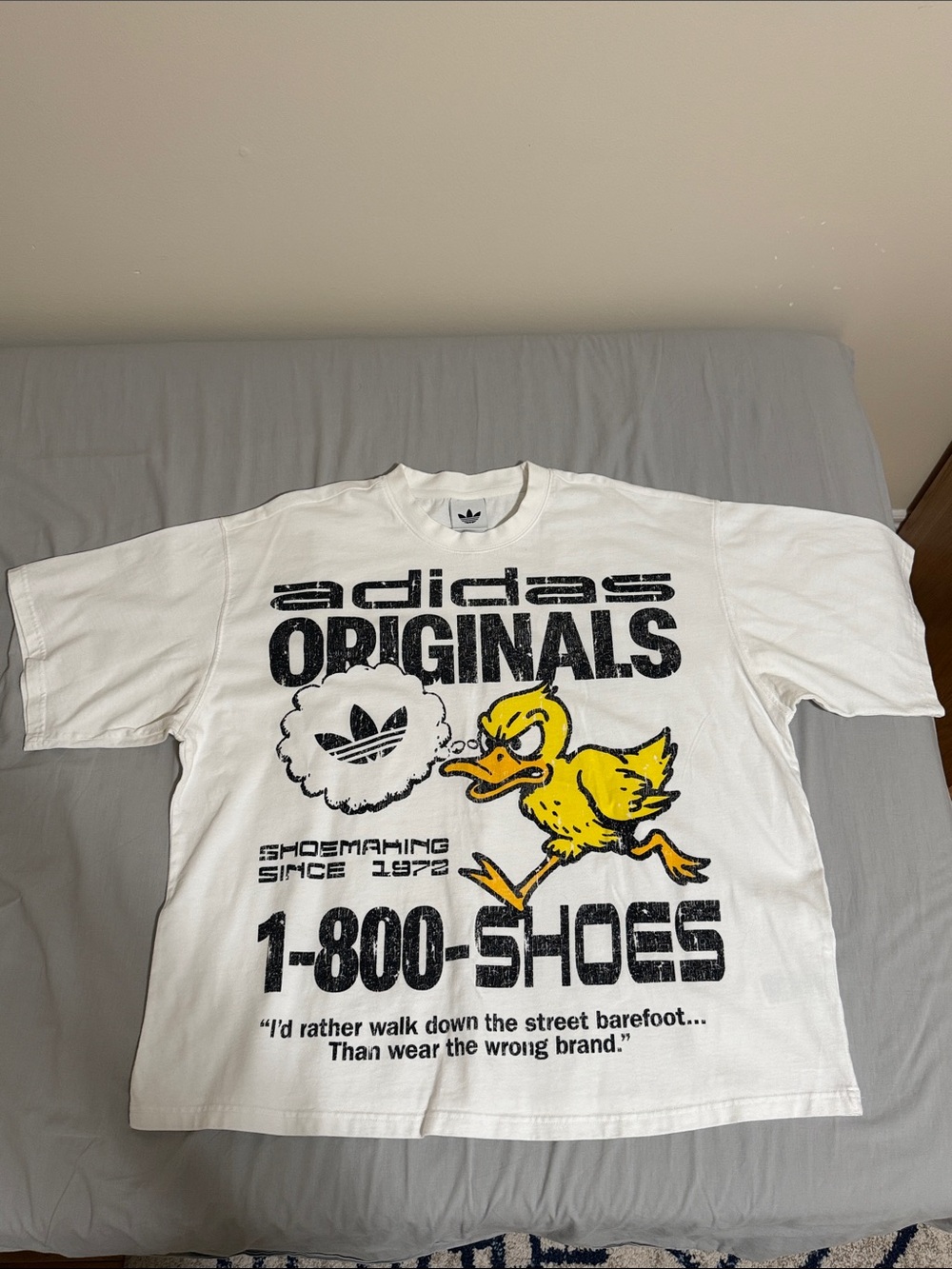 adidas Originals White Tee with Yellow Duck Graphic